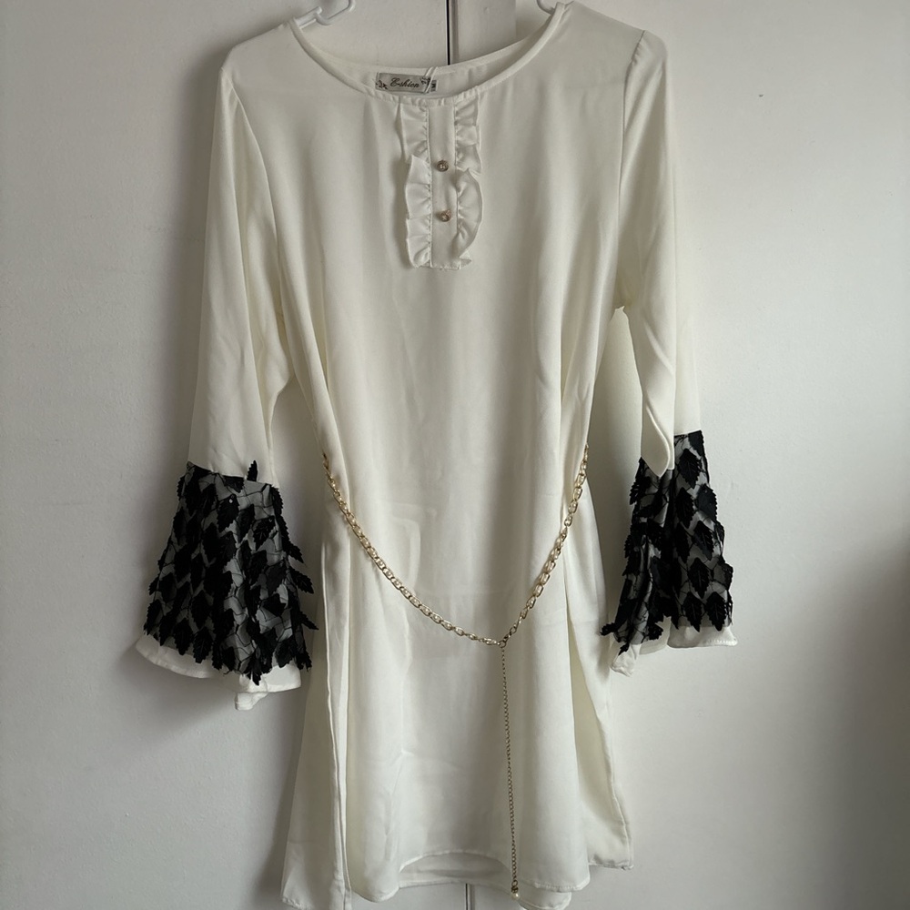 White and Black Dress with Chain Detail